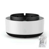 Blinkcee multifunctional ashtray and air purifier on a desk, with sleek design and visible air vents for home or office use.