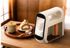 Handheld Blinkcee Smart Food Printer Machine with nozzle and control panel, designed for creative food printing.