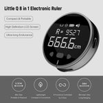 Electric distance measuring ruler by Blinkcee showing digital display and measuring tape extension in use.