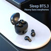 Mini invisible earbuds by Blinkcee shown in a sleek black design, fitting discreetly in the ear for wireless listening.